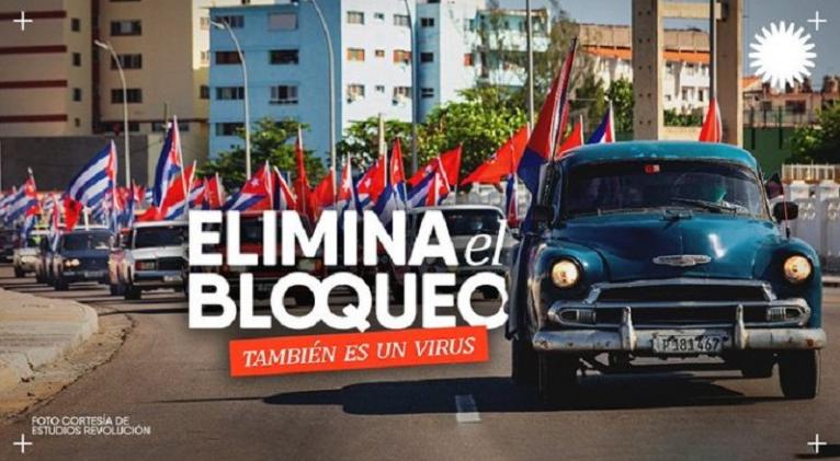 Banner alegórico al bloqueo contra Cuba